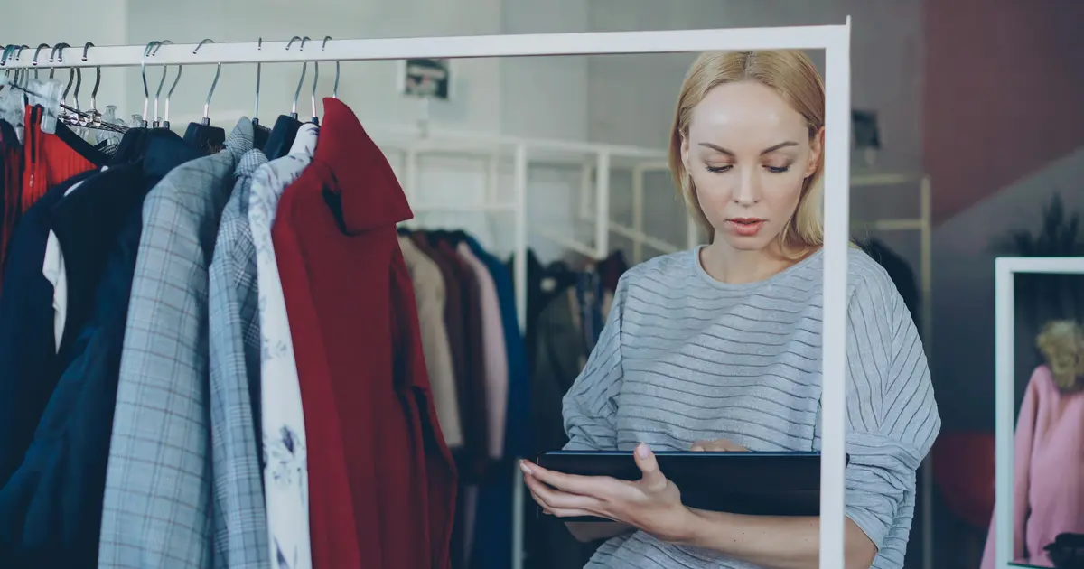 Retailer using a tablet with the Square interface in their store